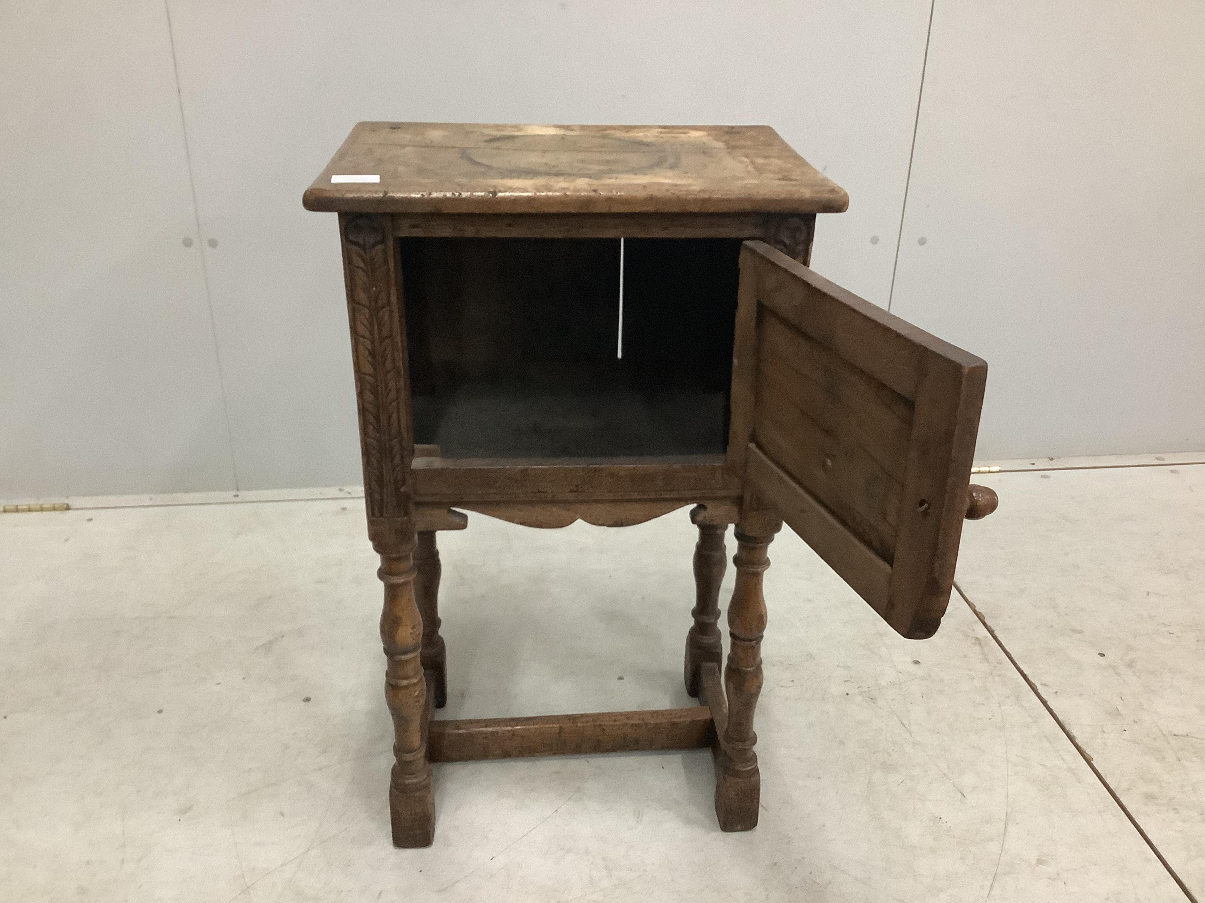 An 18th century style Ipswich oak bedside cabinet, width 47cm, depth 33cm, height 77cm. Condition - poor